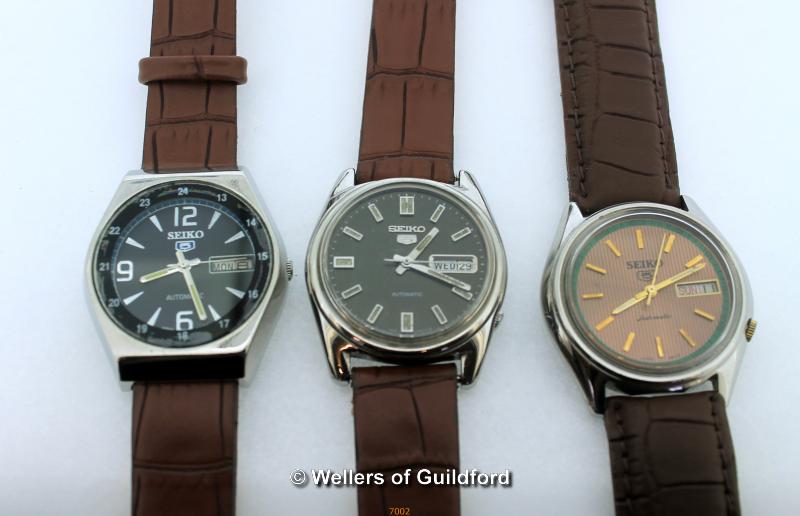 *Three Seiko watches with brown leather straps (Lot subject to VAT)