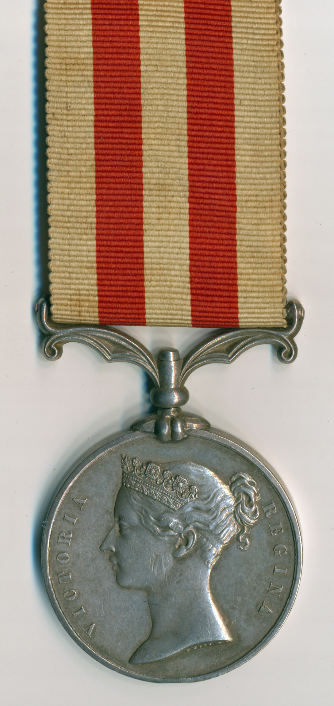 Indian Mutiny Medal no clasp, impressed CORPL Wm GREAVES, 37th REGT. With original ribbon. Sold