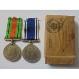 A Second World War London Blitz Police Officer’s long service pair awarded to Constable T.A. Norman,