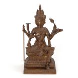 Avalokitheshvara. Indien, Bronze. Auf rechteckigem Sockel sitzende Figur im lockeren Sitz.