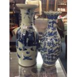 Two large blue and white vases.