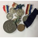 A box containing medals and medallions.