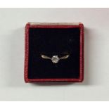A small diamond single stone ring in 18 carat claw
