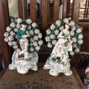 A pair of large decorative figures. (Heavily damag