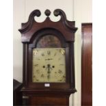 An oak cased Grandfather clock with painted dial.