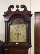 An oak cased Grandfather clock with painted dial.