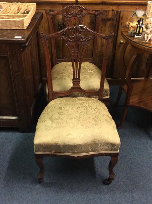 A pair of Edwardian nursing chairs.