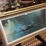 A large framed and glazed picture of a fighter pla