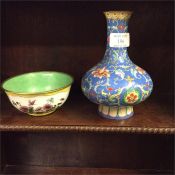 An enamelled vase together with a bowl.