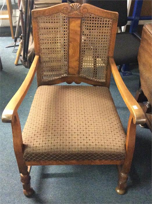 An oak and cane backed chair.