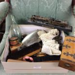 A lacquered box, model train, snuff box etc.