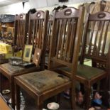 A set of six oak dining chairs.