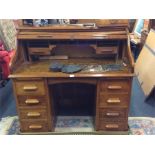 A good oak roll top desk.