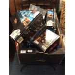 A box containing DVDs of Kiefer Sutherland series