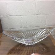 Baccarat: A large heavy glass fruit dish.