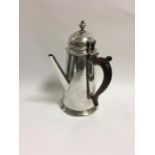 A rare Queen Anne side-handled tapering coffee pot with hinged