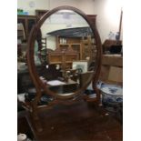 Two mahogany toilet mirrors.