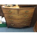 A mahogany chest of five drawers.