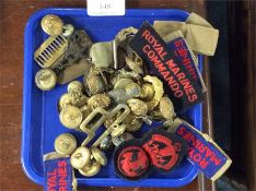 A quantity of old buttons and badges.