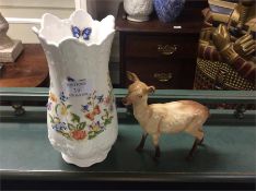 An Aynsley vase together with a Beswick deer.
