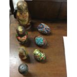 Three old nesting Matryoshka dolls together with t