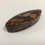 An Antique tortoiseshell snuff box with silver bri