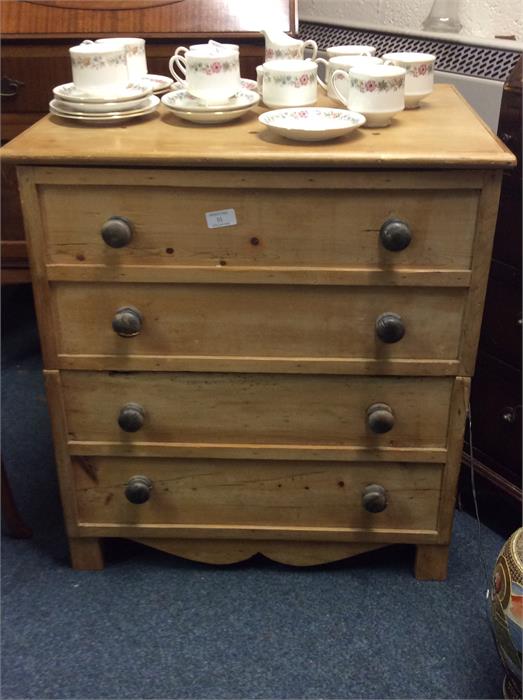 A pine hinged top commode.