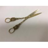 A pair of good silver gilt scissors with vine deco