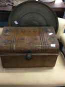 A tin trunk together with an Eastern tray.
