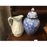 A harvest jug together with an Oriental vase.