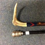 A good EPNS mounted walking cane together with one