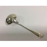 A Georgian silver bright cut soup ladle. London. B