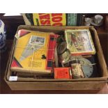 A box containing toys, jigsaw puzzles etc.
