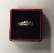 A diamond single stone ring in 9 carat claw mount.