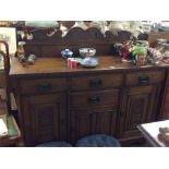 A stylish oak three door sideboard.