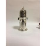 A good quality modern silver lighthouse caster att