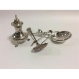 A collection of silver cutlery including pepper, s