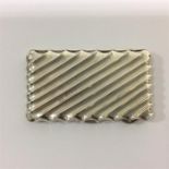 A good silver hinged purse of fluted design, fitte
