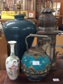 Old lamps, a kettle and a vase etc.