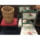 A pair of green upholstered chairs together with a