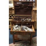 A mahogany cased plated cutlery set.