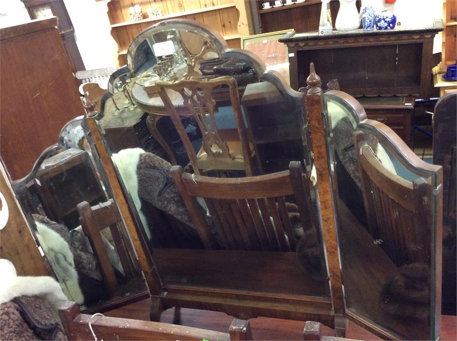 A burr walnut triple mirror.