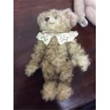 Steiff: A teddy bear numbered 654084.