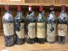 Six bottles of vintage wines.