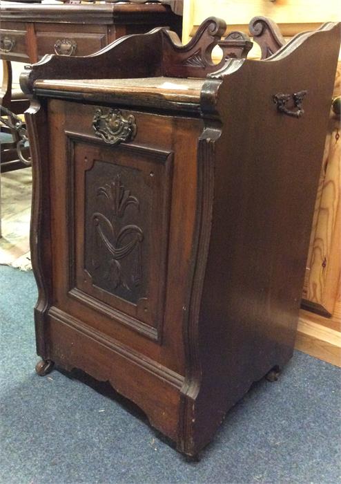 An Edwardian carved coal padonium.