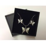 A silver and MOP butterfly pendant together with m