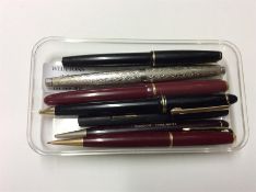 A collection of old Parker and other fountain pens