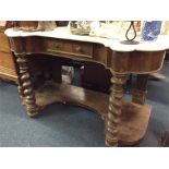 An old marble top and mahogany wash stand.