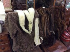 A good quality old fur coat together with other fu