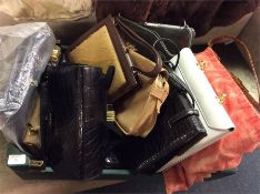 A box of lady's handbags.